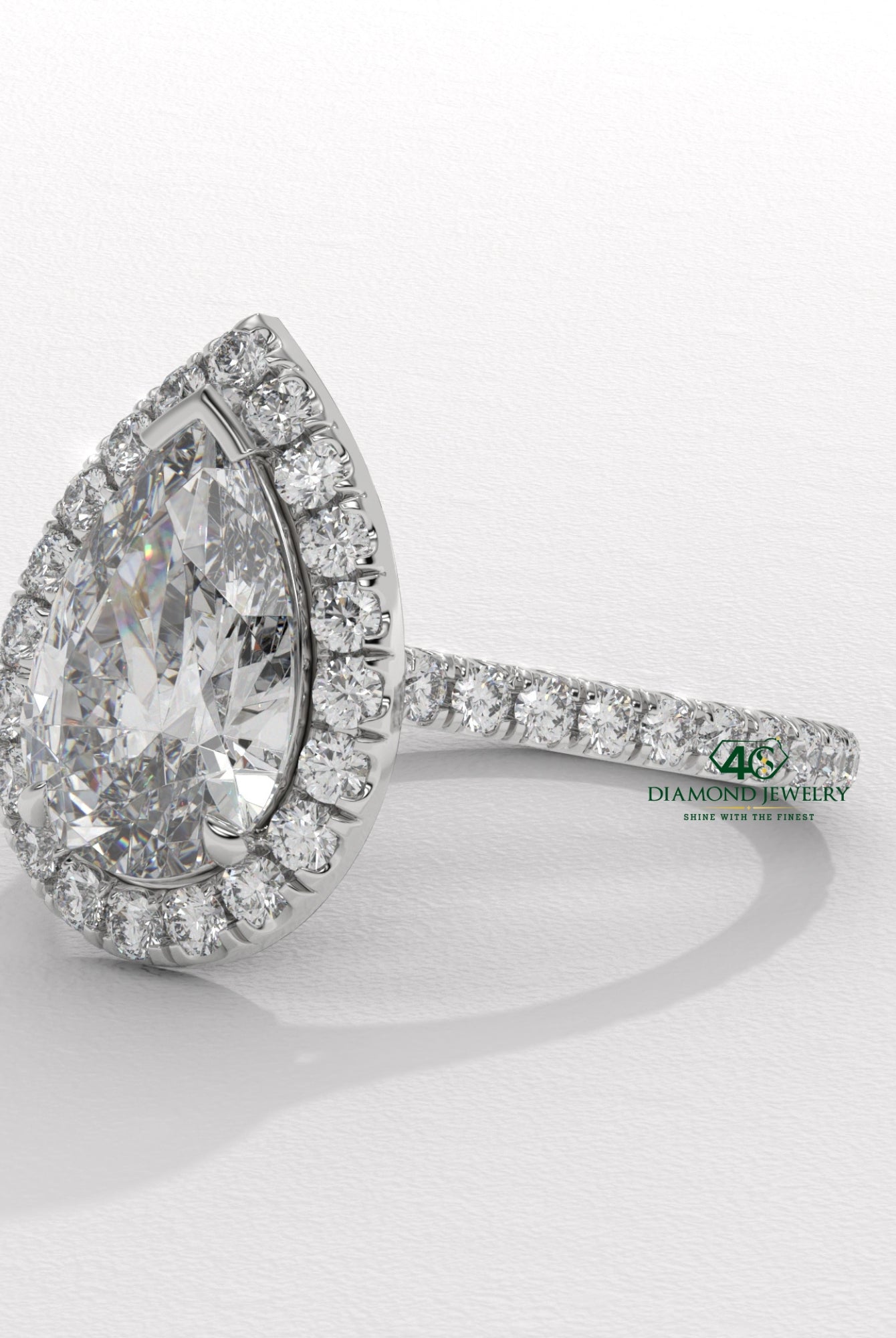 pear diamond engagement ring, pear shaped diamond ring, gold pear diamond ring, pear cut diamond engagement ring, white gold pear diamond ring