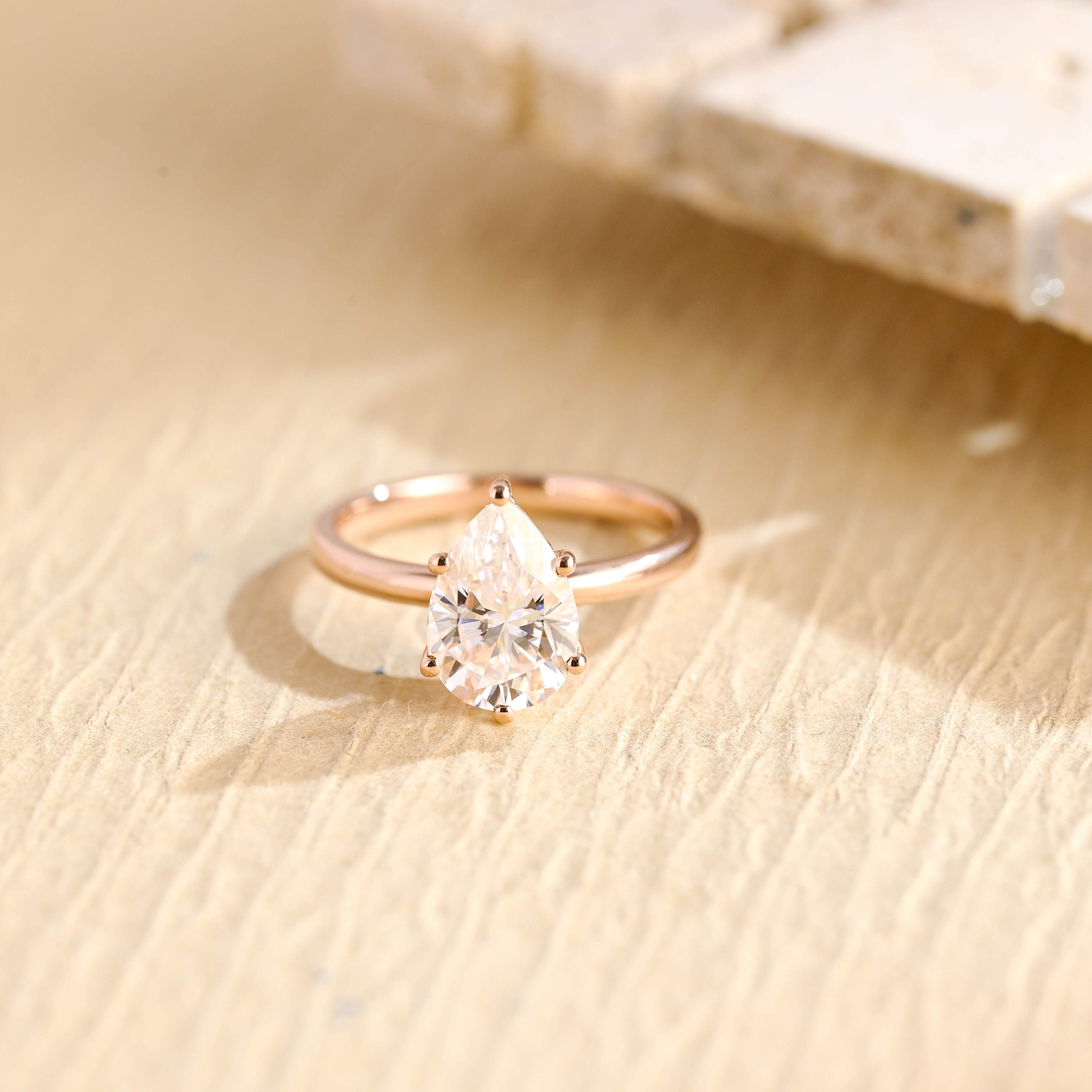 1 carat pear cluster engagement ring moissanite