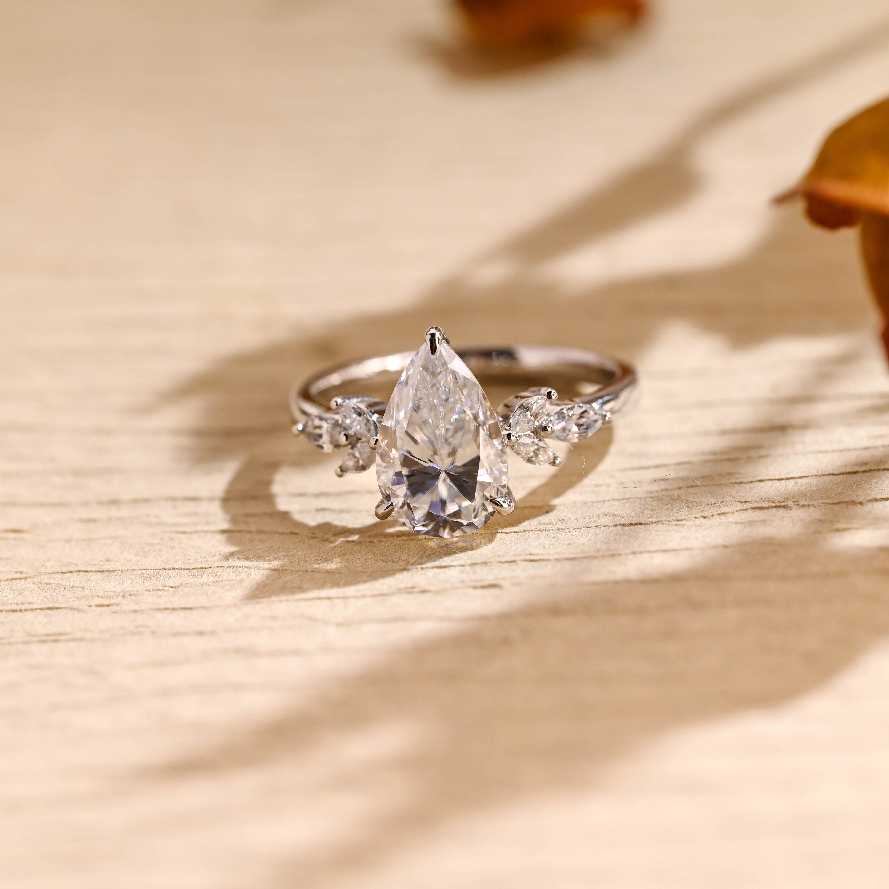 1 carat pear cluster engagement ring moissanite
