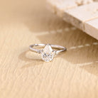 1 carat pear five stone engagement ring moissanite