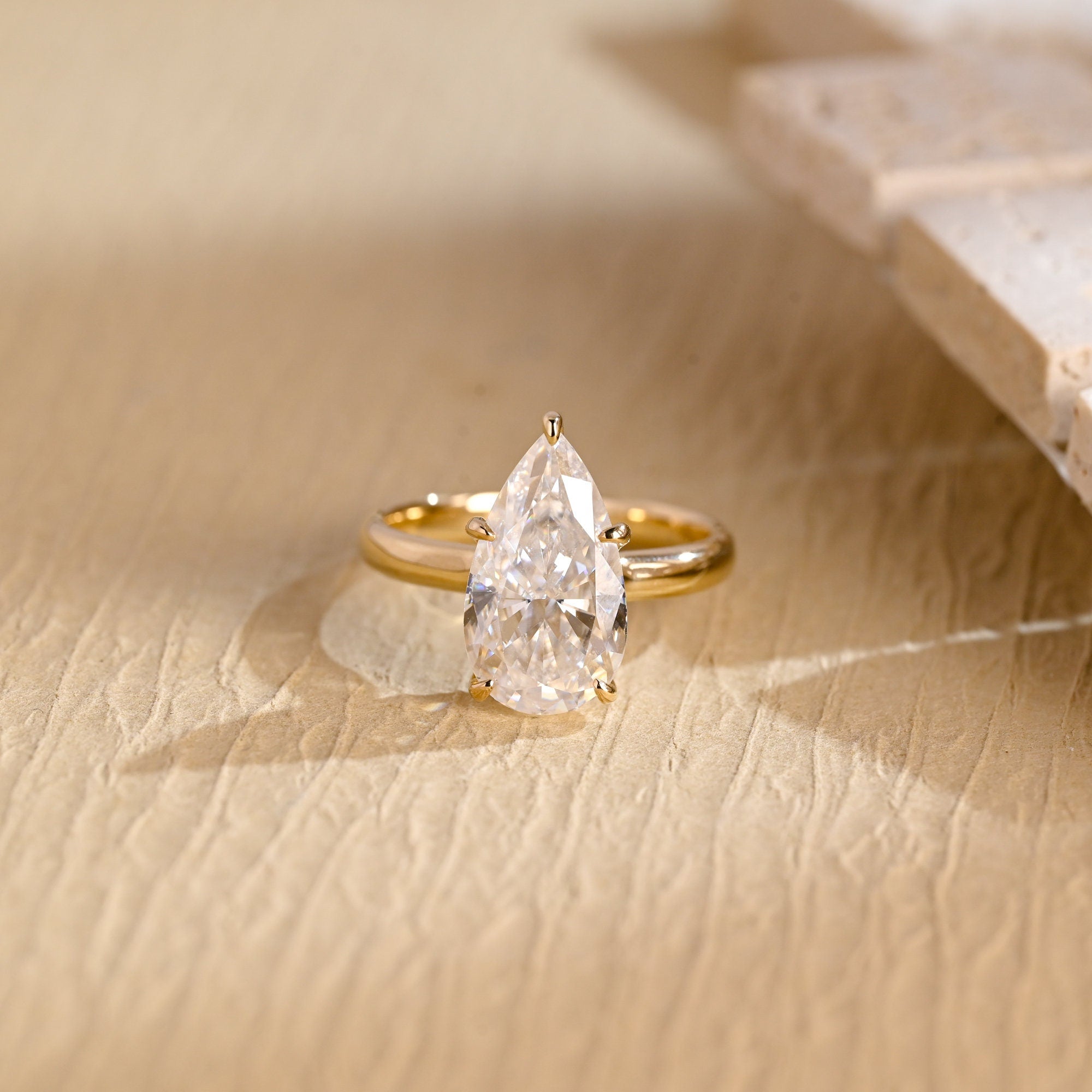 1 carat pear hidden halo engagement ring moissanite