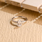 1 carat pear cut solitaire moissanite engagement ring