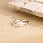 1 carat pear cut solitaire moissanite engagement ring