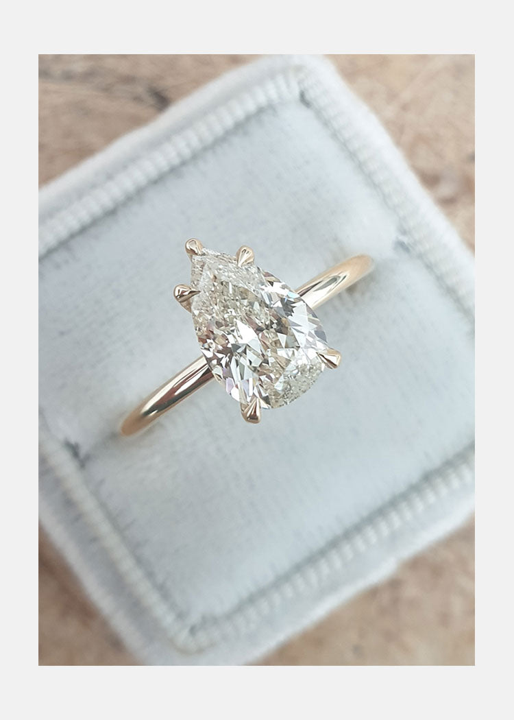 Pear Cut Moissanite Solitaire Engagement Ring