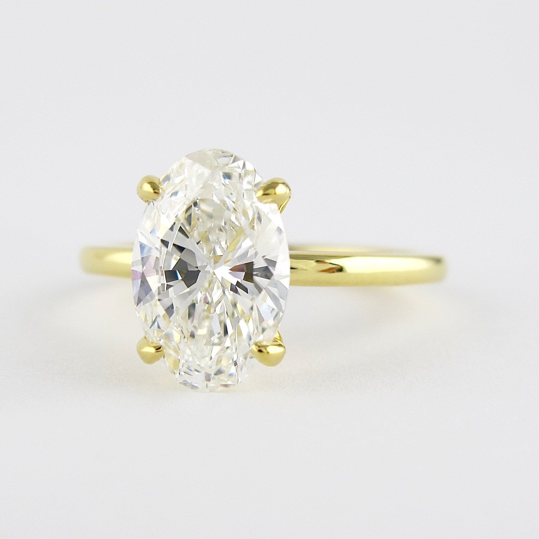 Four Prong Moissanite Ring