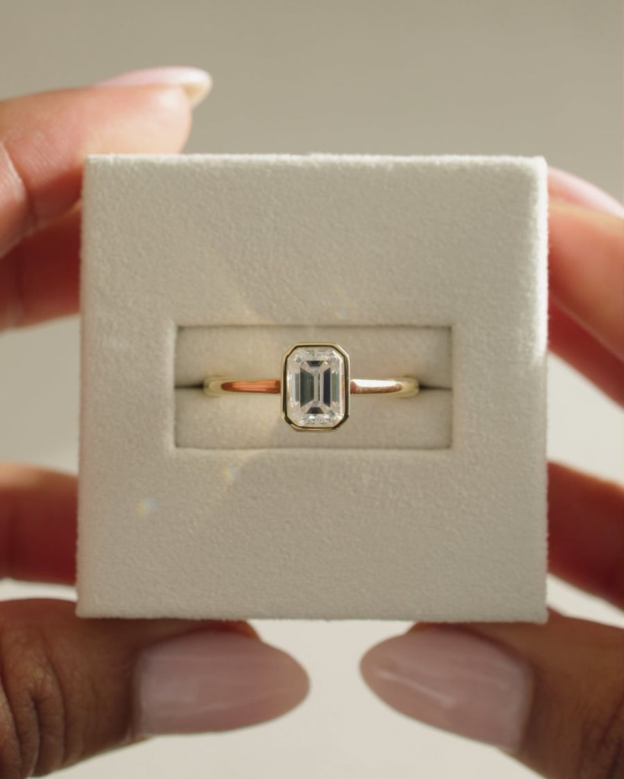 Emerald Cut Bezel Moissanite Ring