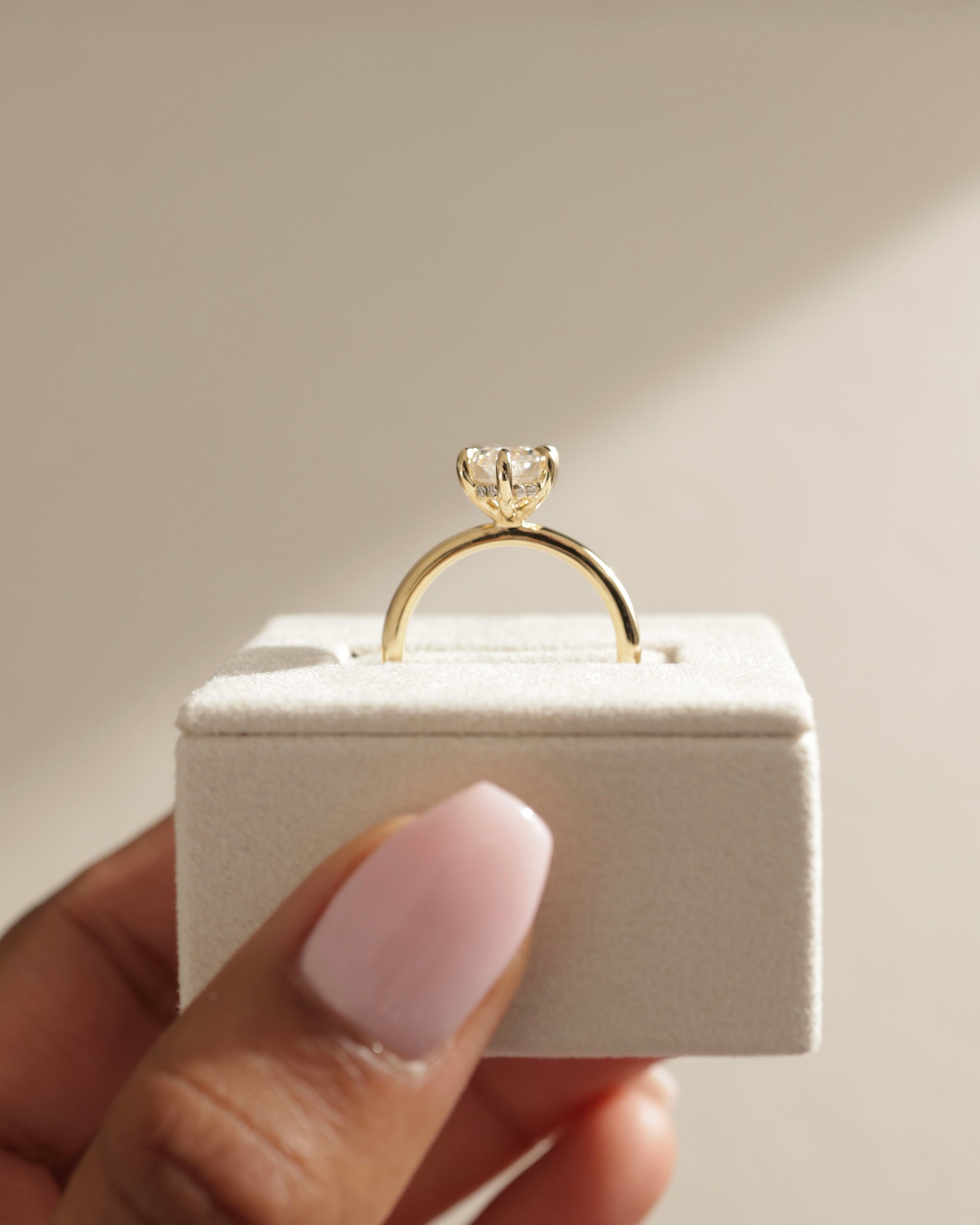 hidden halo engagement ring, hidden halo diamond ring, gold hidden halo ring, white gold hidden halo setting, rose gold hidden halo ring, kite diamond ring, kite cut diamond engagement rings