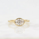 Oval Bezel Set Engagement Ring