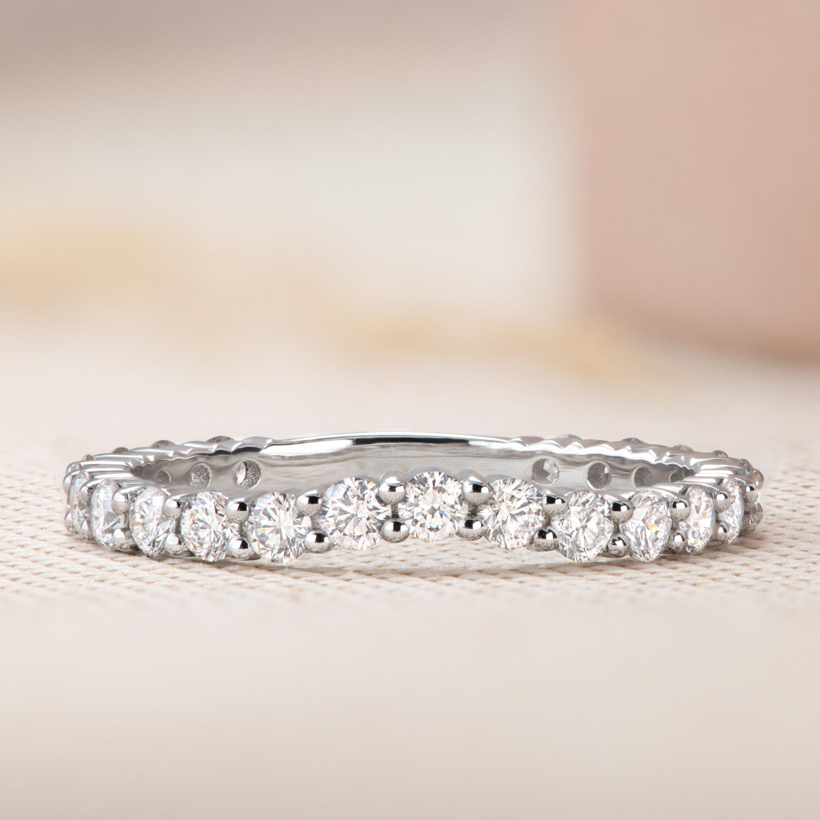 0-63-ct-round-shaped-moissanite-semi-eternity-wedding-band