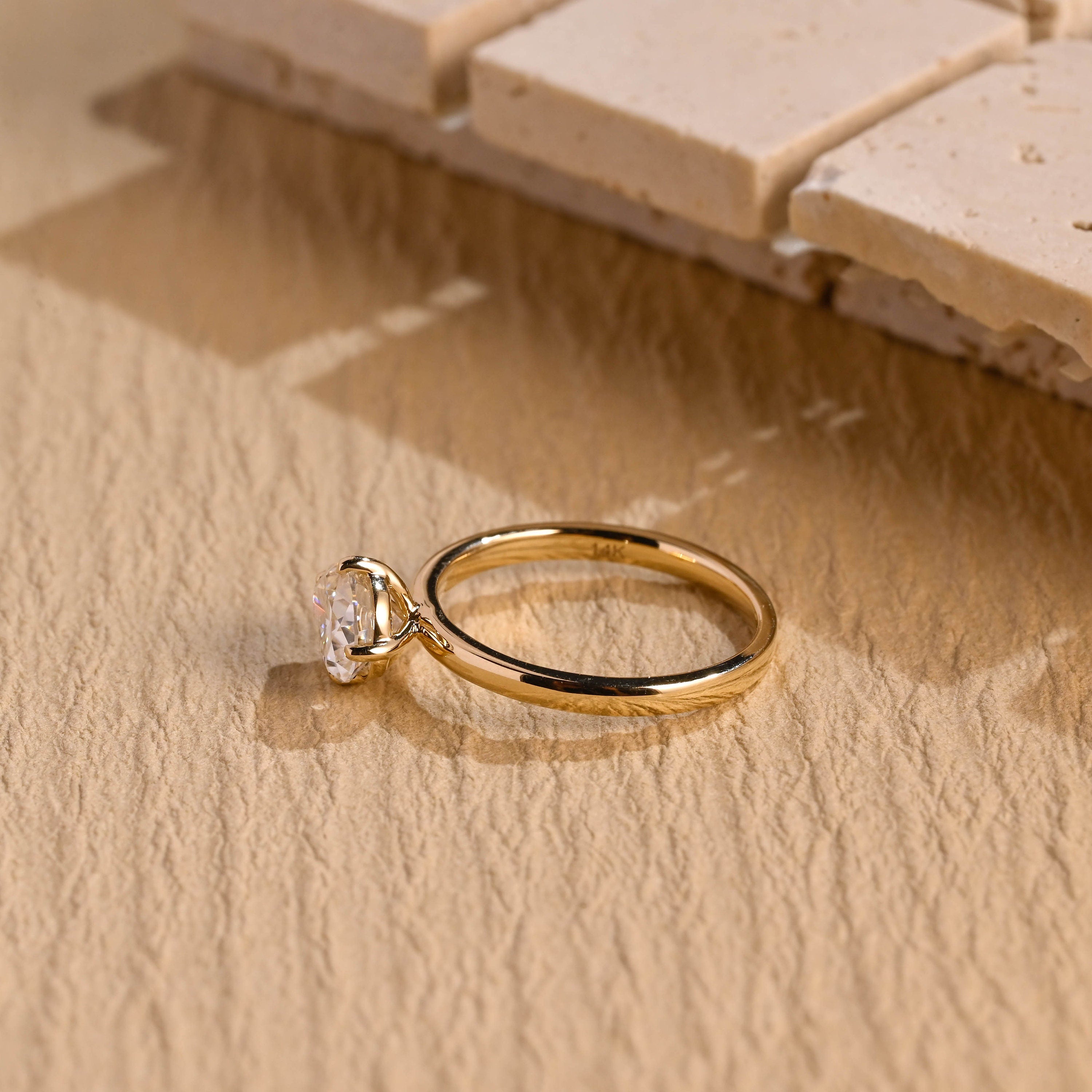 horizontal pear engagement ring moissanite