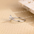 lab grown pear five stone engagement ring