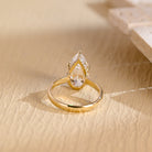 diamond hidden halo pear moissanite engagement ring
