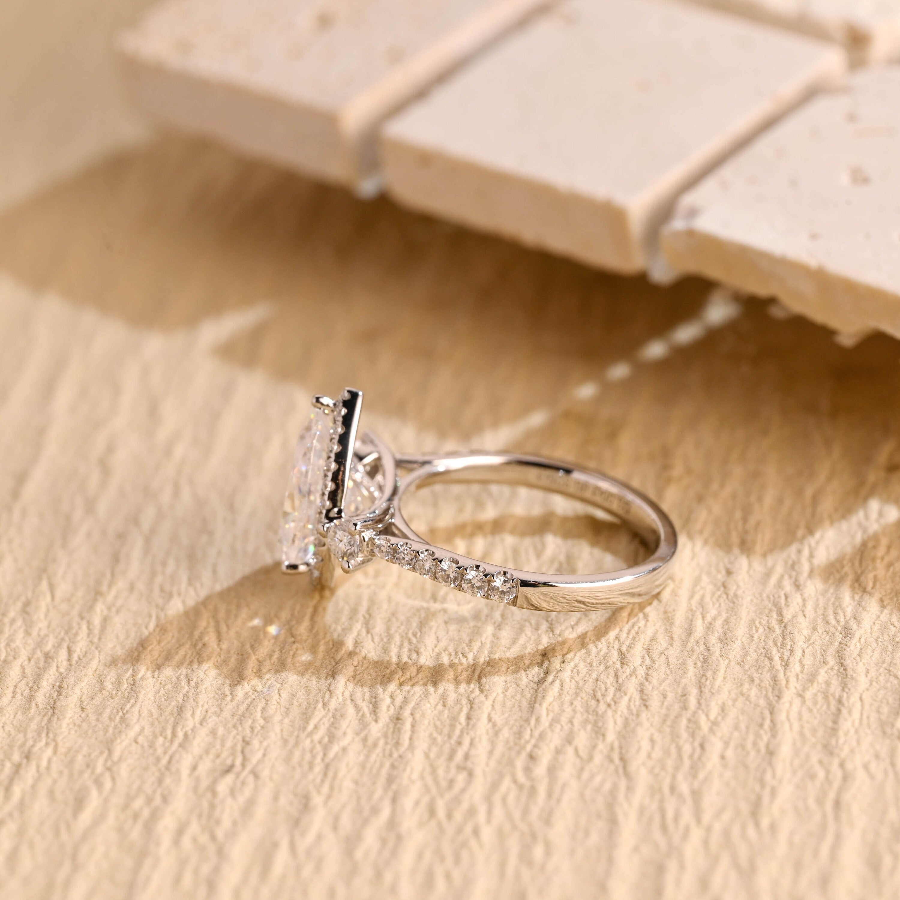 pear cut three stone moissanite ring USA