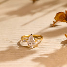 pear cut three stone moissanite engagement ring