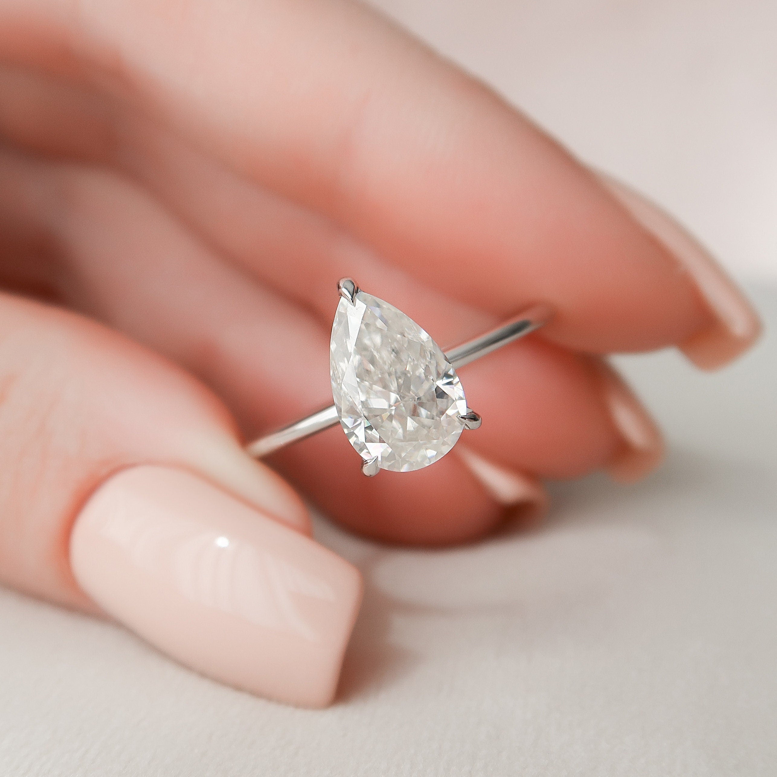 Pear Moissanite Engagement Ring