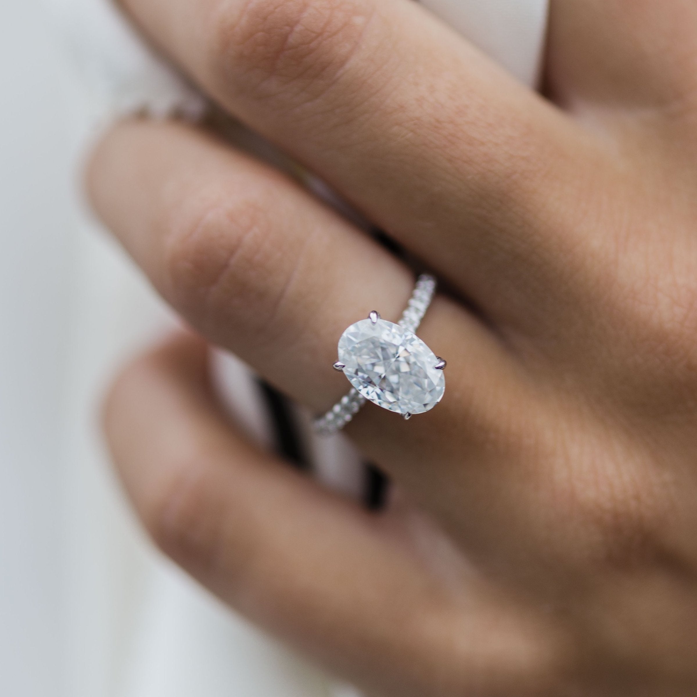 Oval Hidden Halo Moissanite Ring