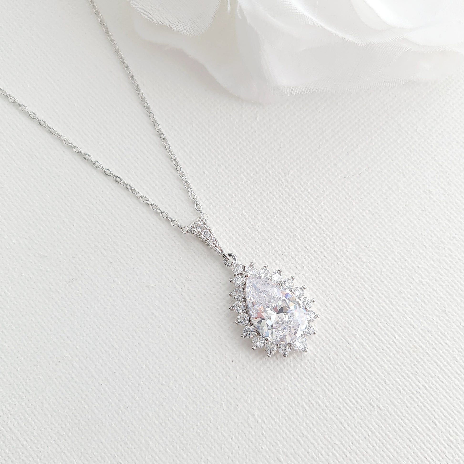 1-0-ct-pear-moissanite-halo-drop-necklace-for-women