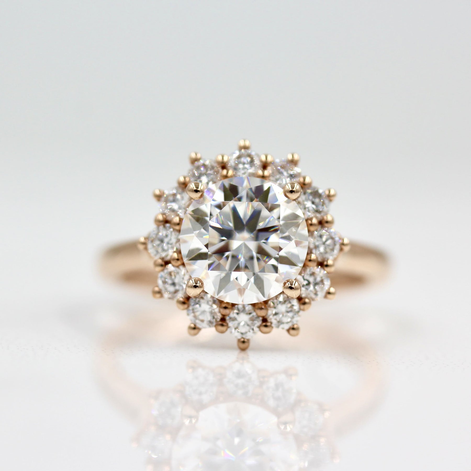 Vintage-inspired round moissanite engagement rings