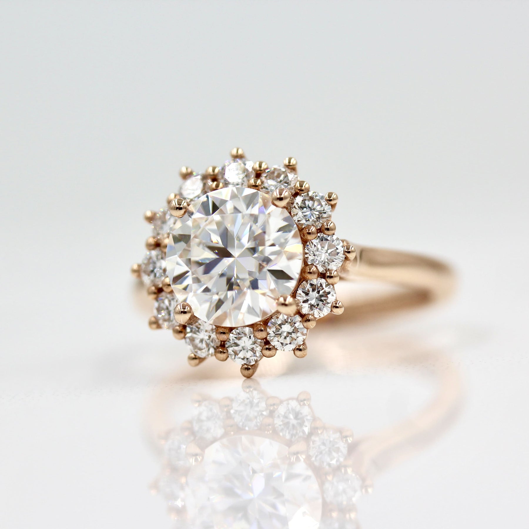 Vintage-inspired three-stone moissanite engagement rings