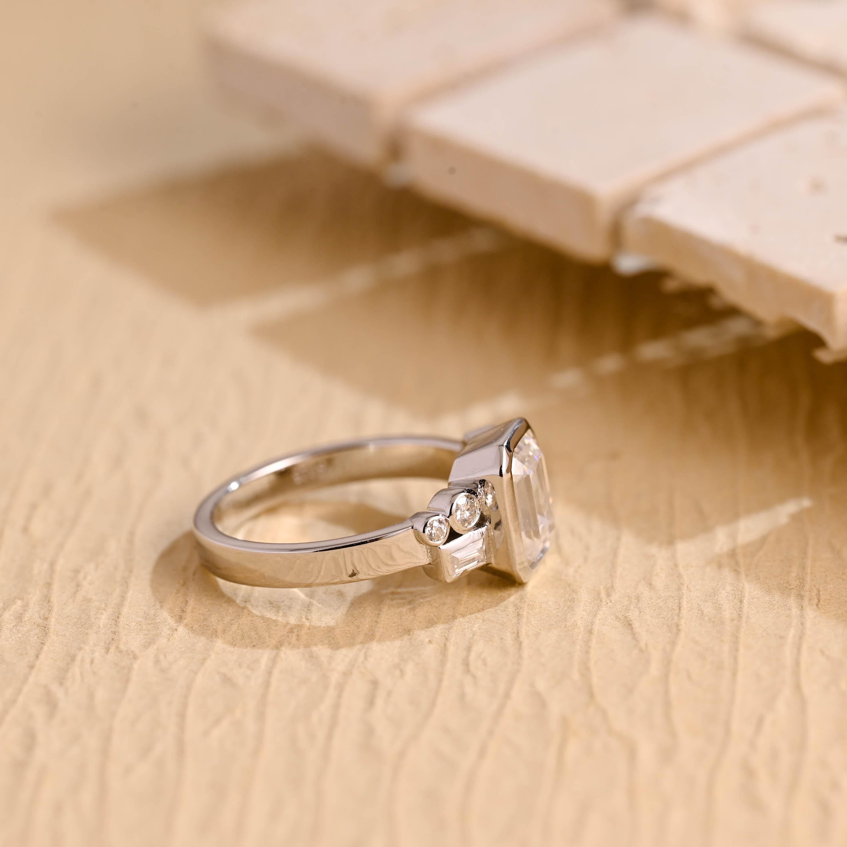 minimalist emerald bezel cluster moissanite engagement ring