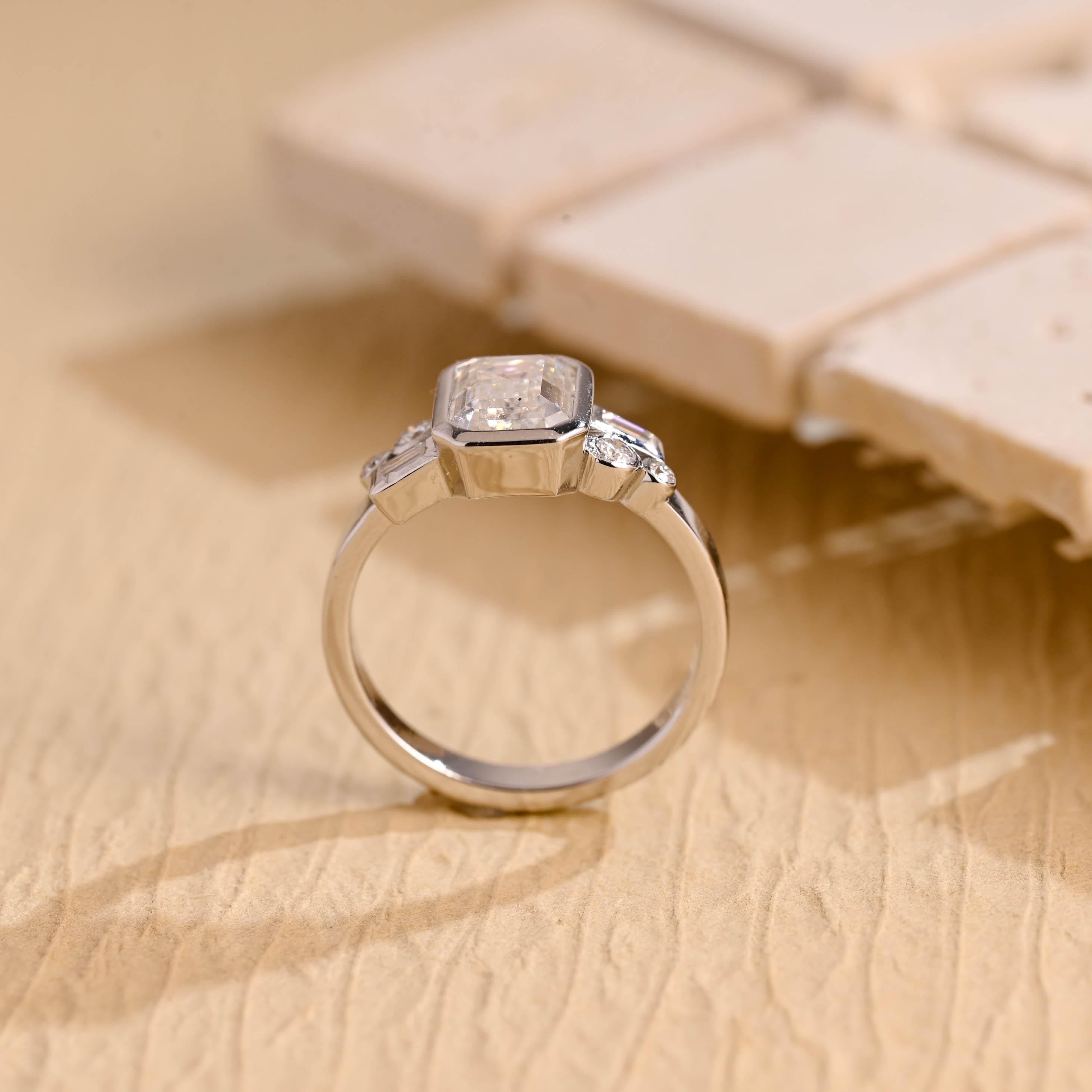 bridal emerald cut bezel cluster engagement ring USA