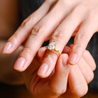 high sparkle pear three stone moissanite engagement ring