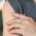 sparkling pear hidden halo engagement ring moissanite