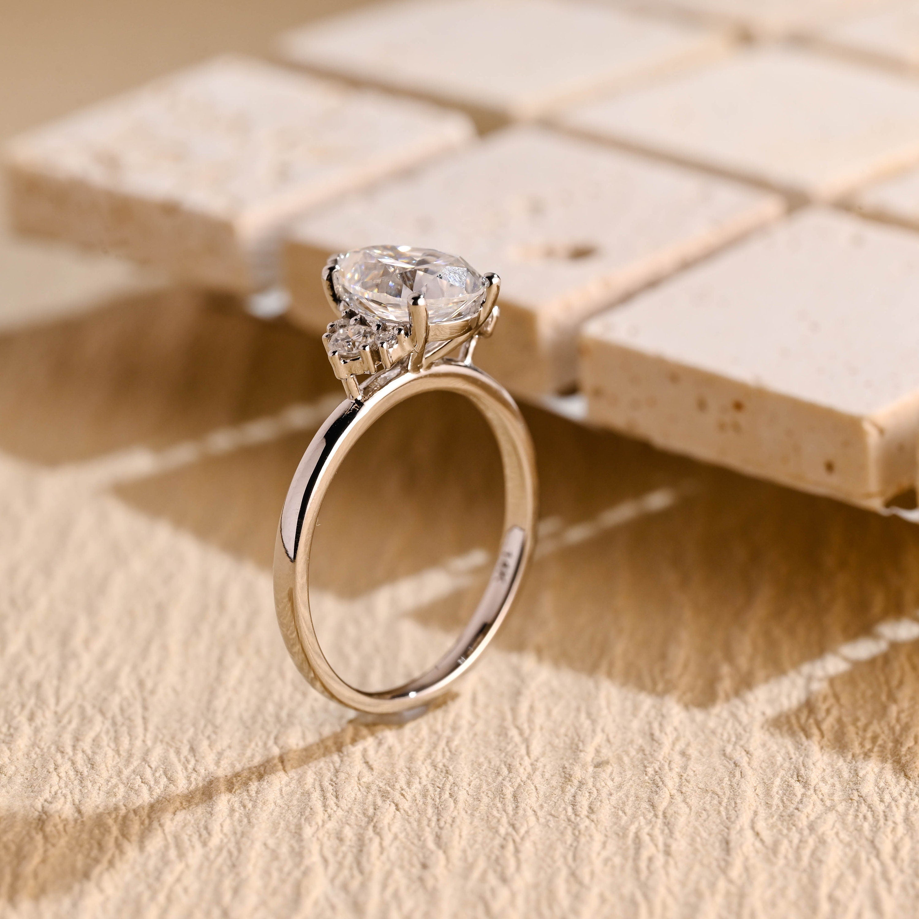 designer pear moissanite engagement ring