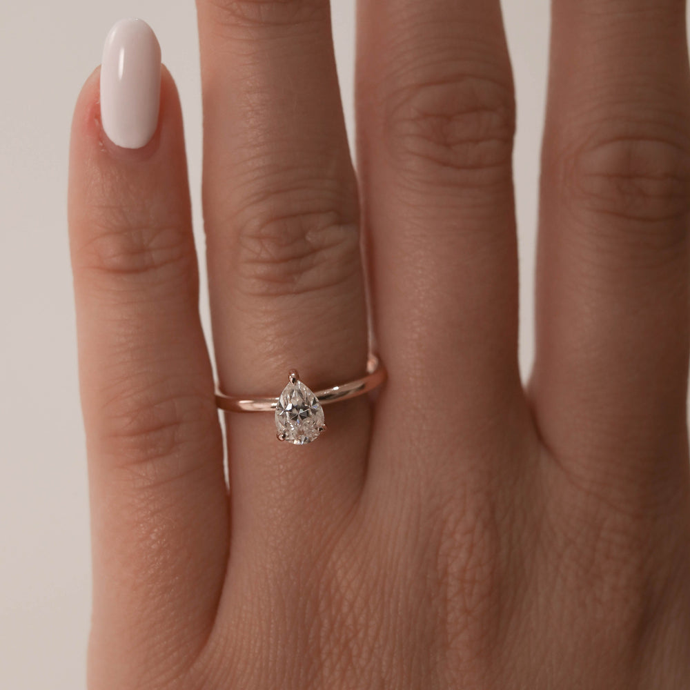 0.80CT Pear Solitaire Moissanite Diamond Engagement Ring In Solid Gold