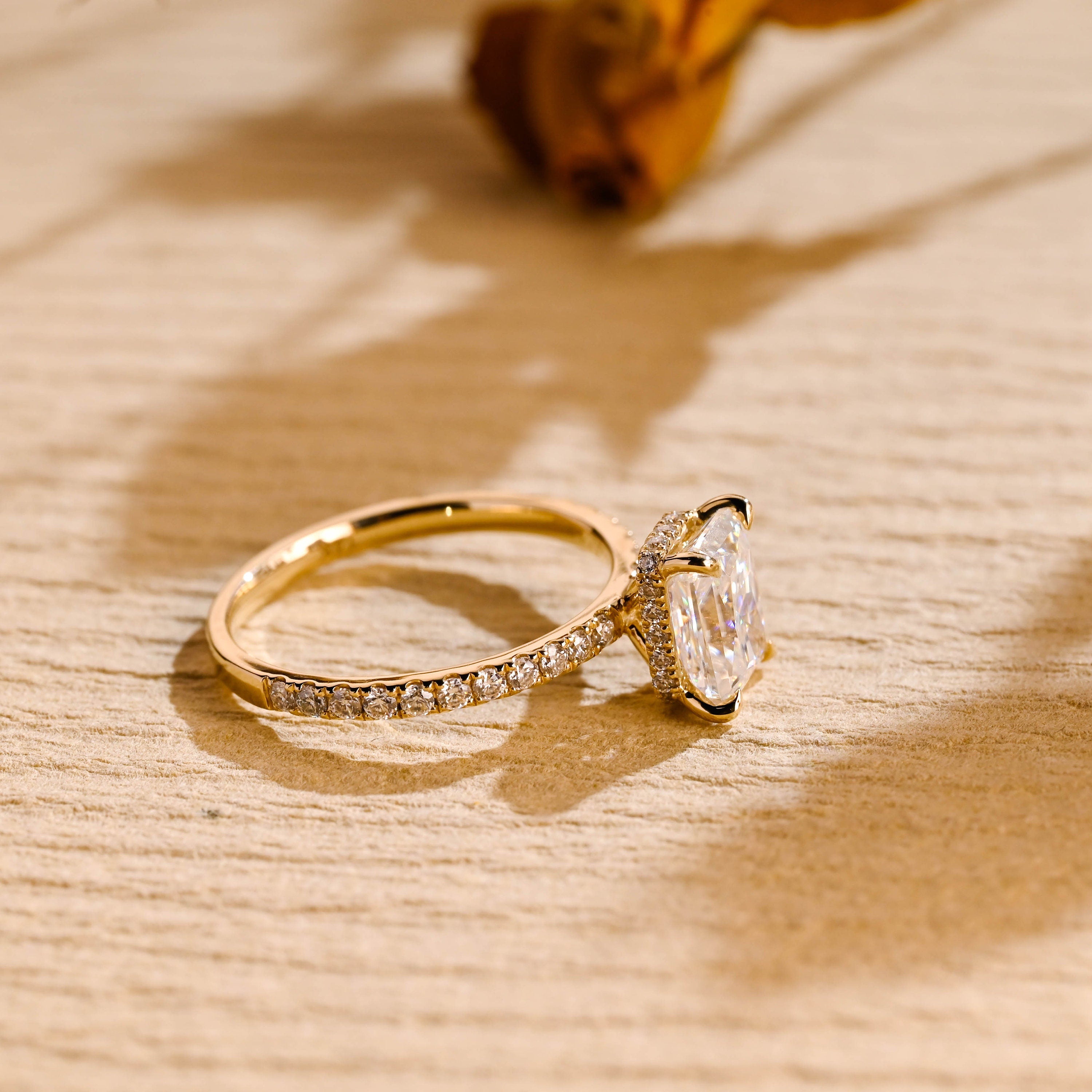 gold hidden halo moissanite engagement ring radiant cut