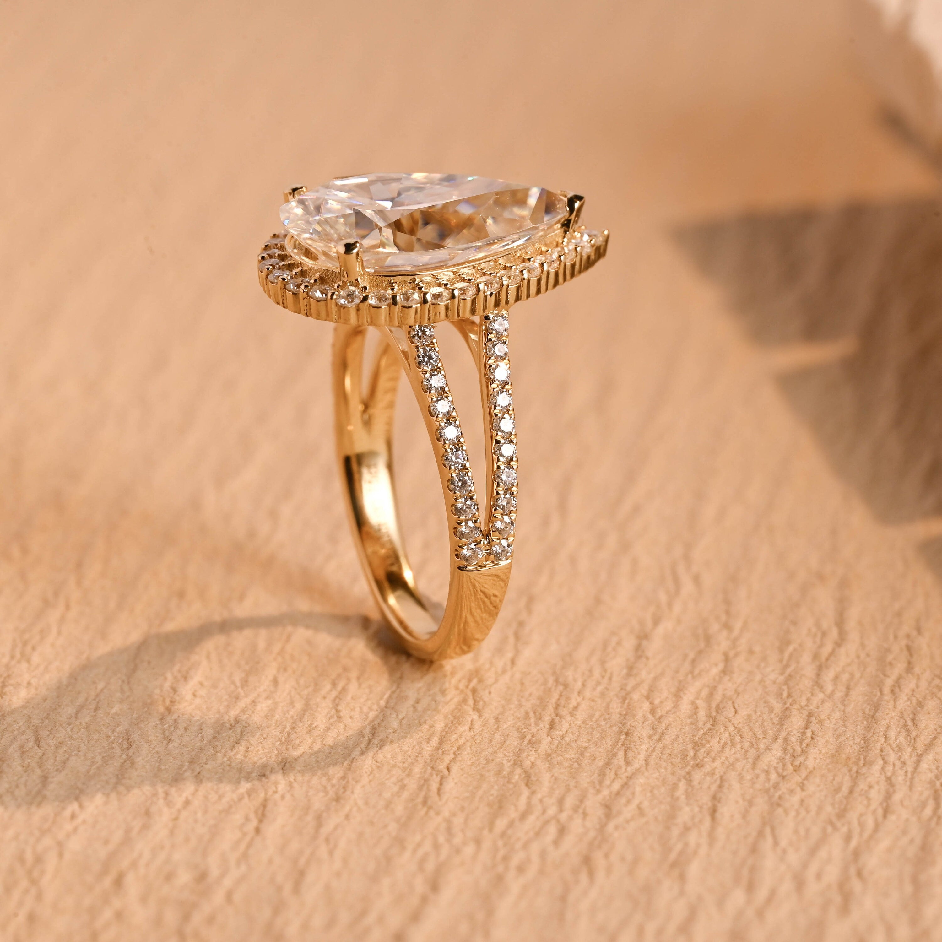 pear cut moissanite halo engagement ring