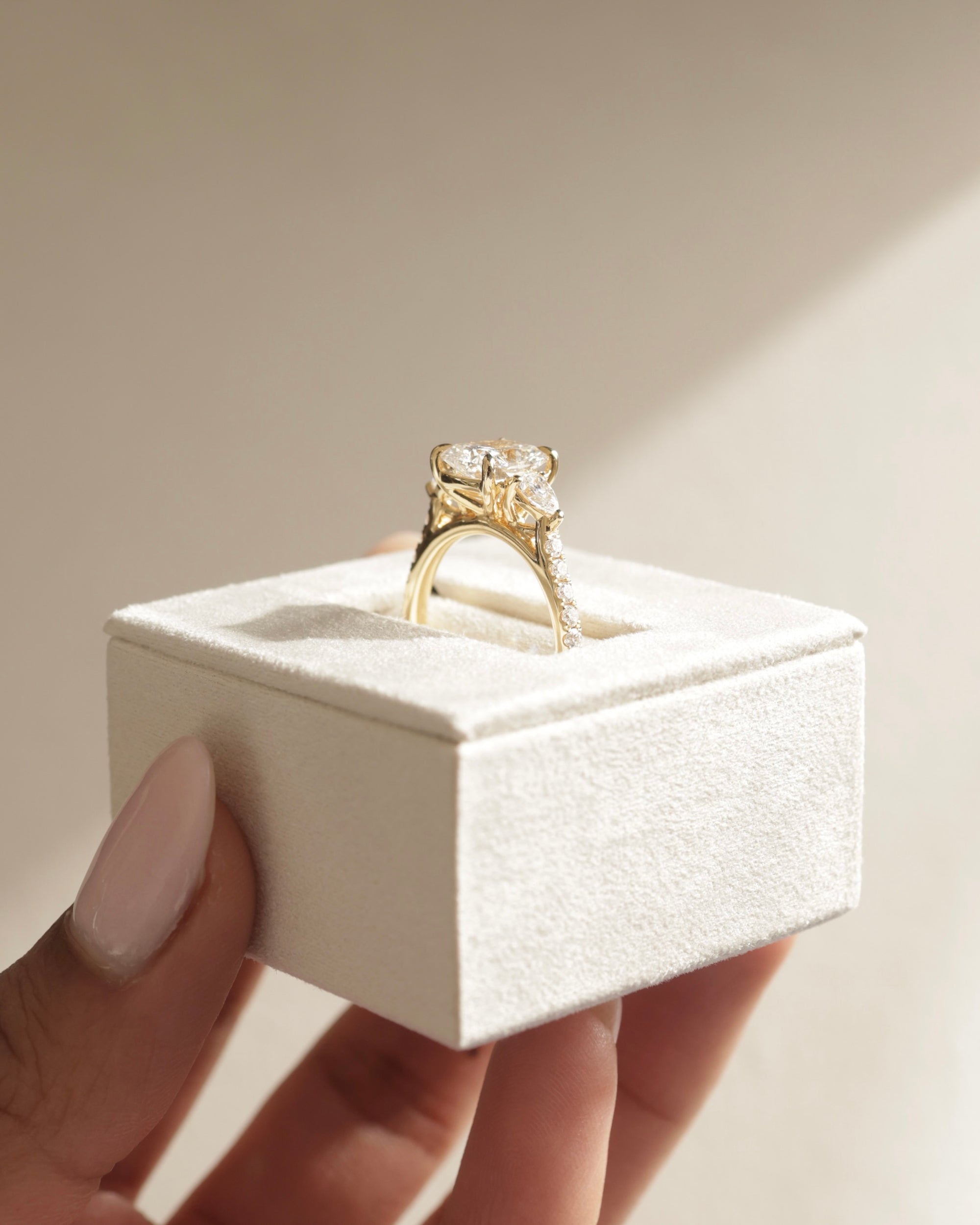 Elegant Three Stone Elongated Cushion Cut Ring