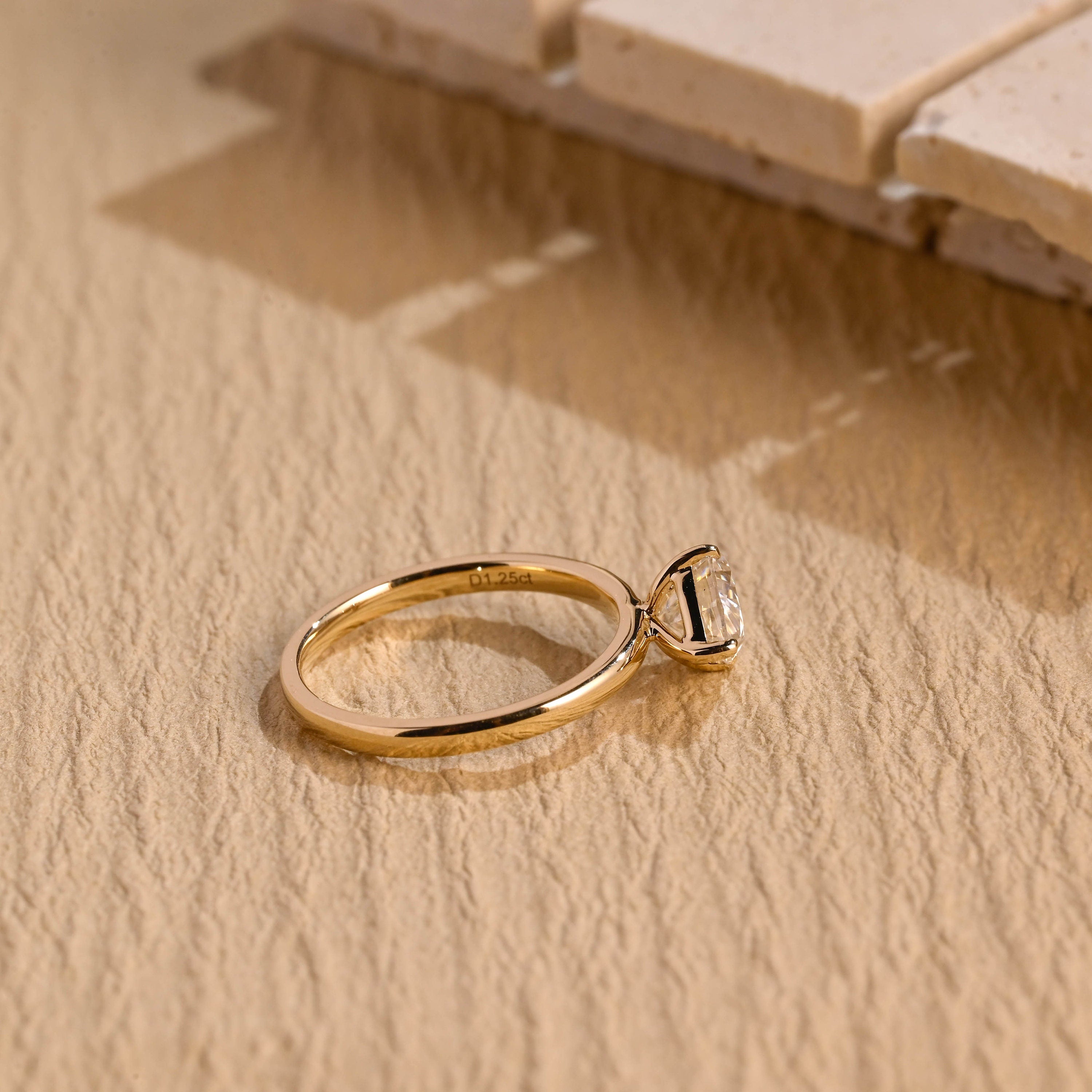 sustainable east west pear engagement ring moissanite
