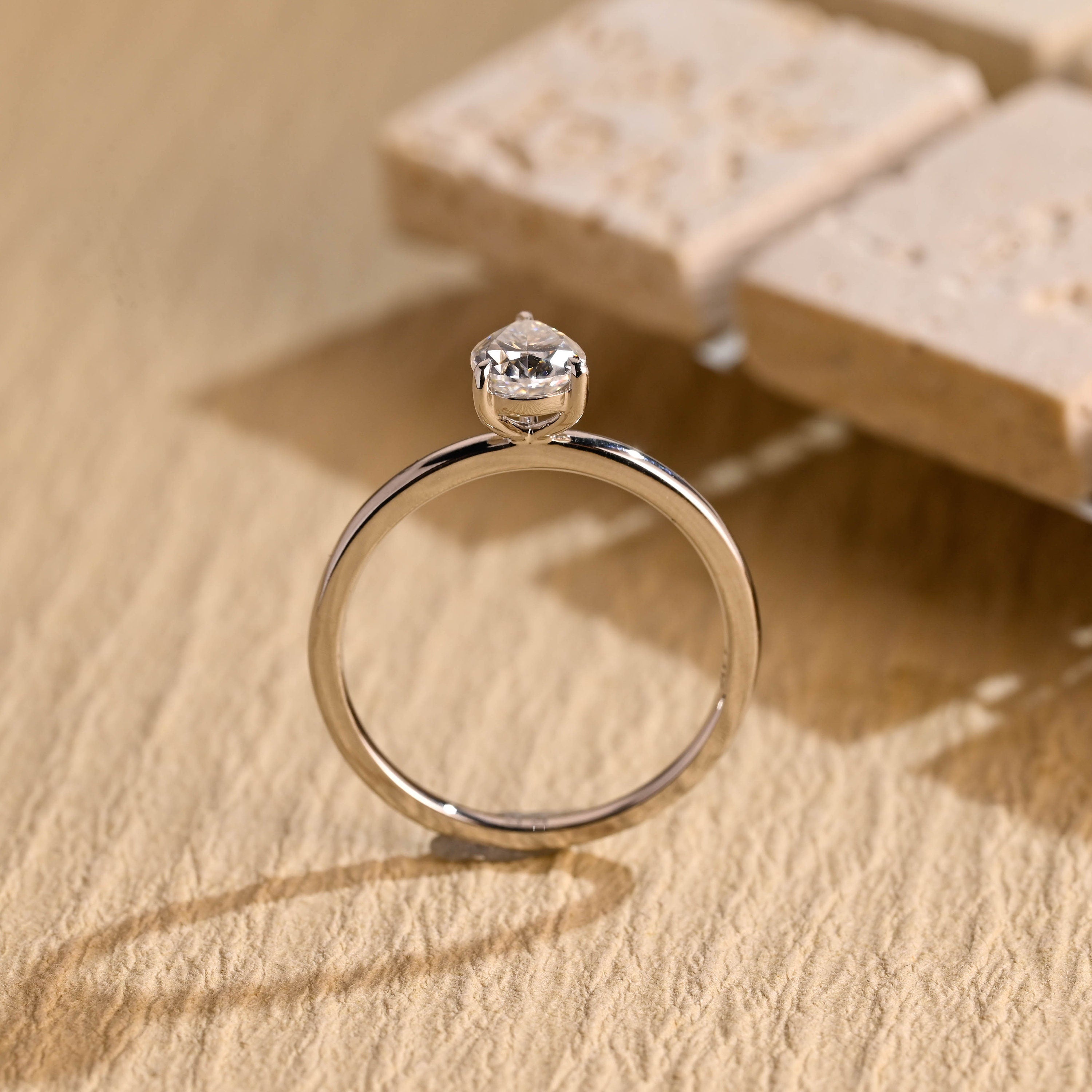 elegant pear cut solitaire engagement ring