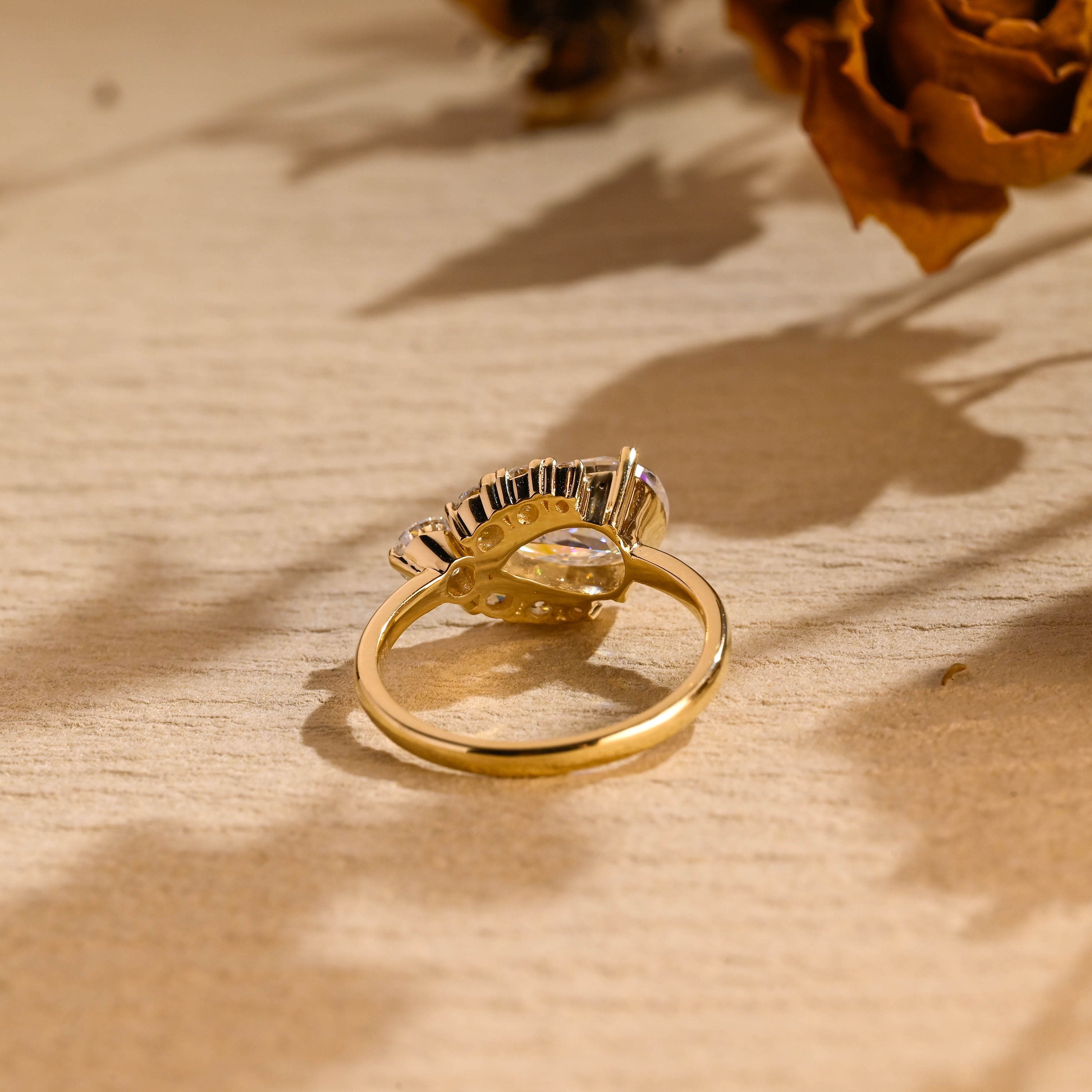 pear cut cluster moissanite engagement ring