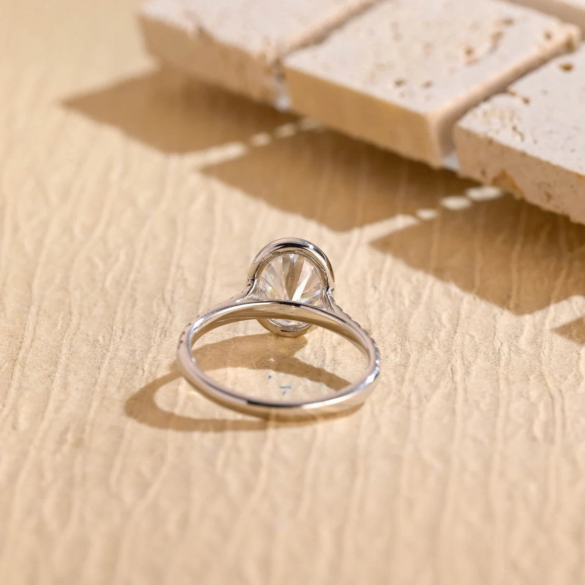 Elegant Oval Diamond Ring with Bezel Setting
