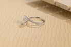1 carat pear moissanite pavé engagement ring