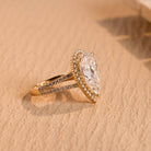 pear shape halo engagement ring moissanite