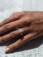 Elongated Cushion Engagement Ring Featuring a Pave Diamond Setting