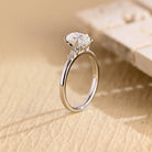 sustainable pear five stone engagement ring moissanite