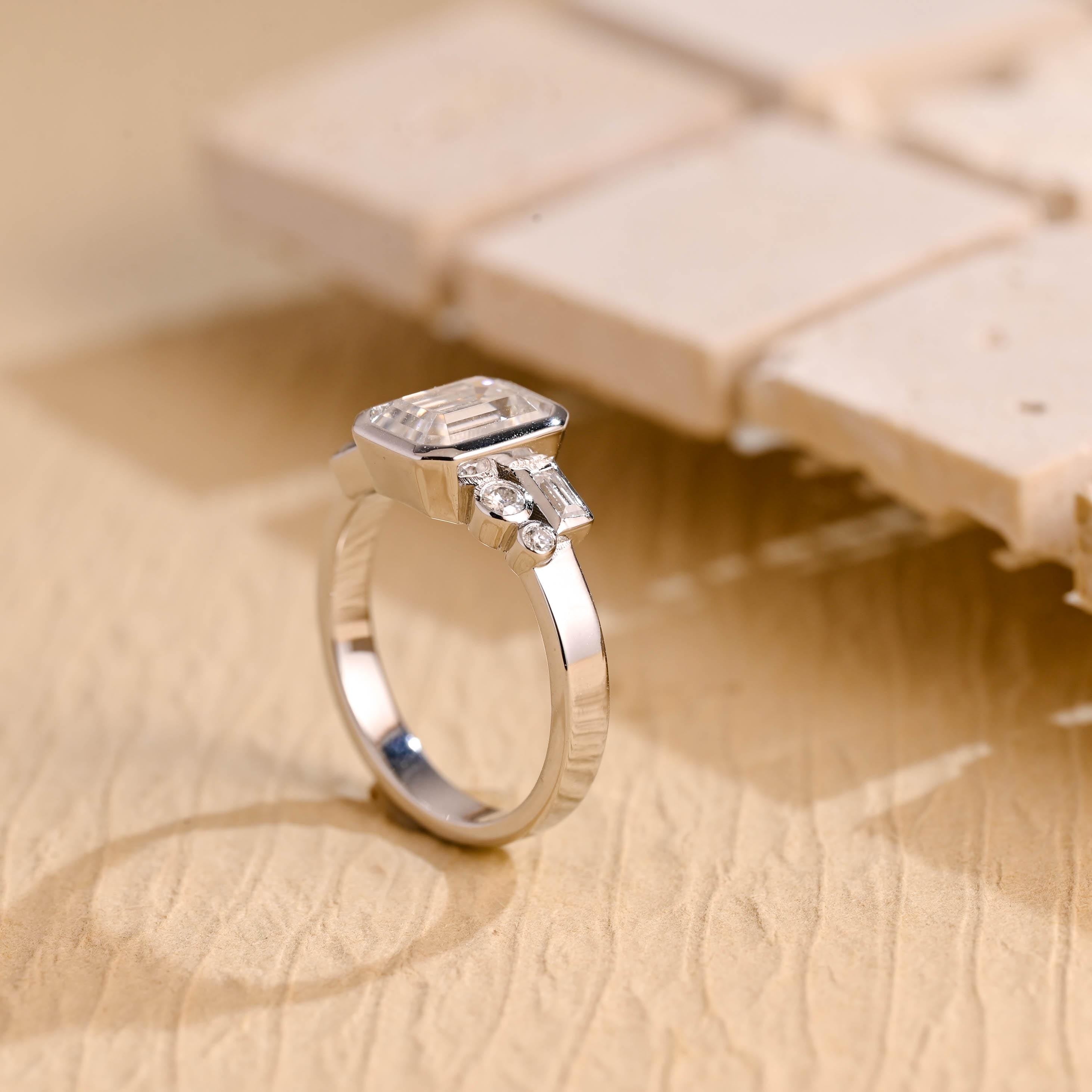 certified emerald cut bezel cluster moissanite ring