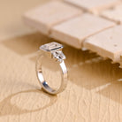 certified emerald cut bezel cluster moissanite ring