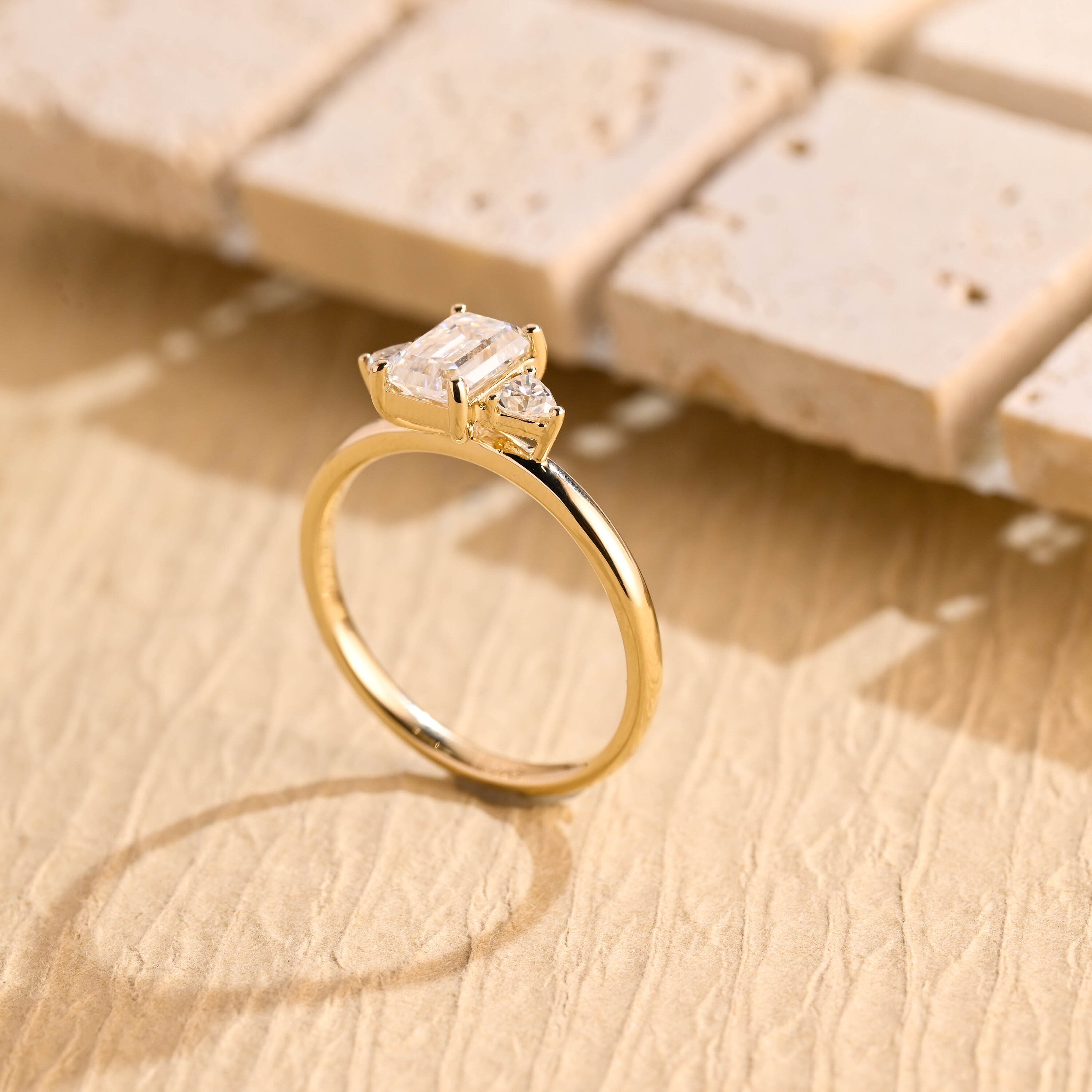 Buy Emerald Cut Three Stone Moissanite Ring