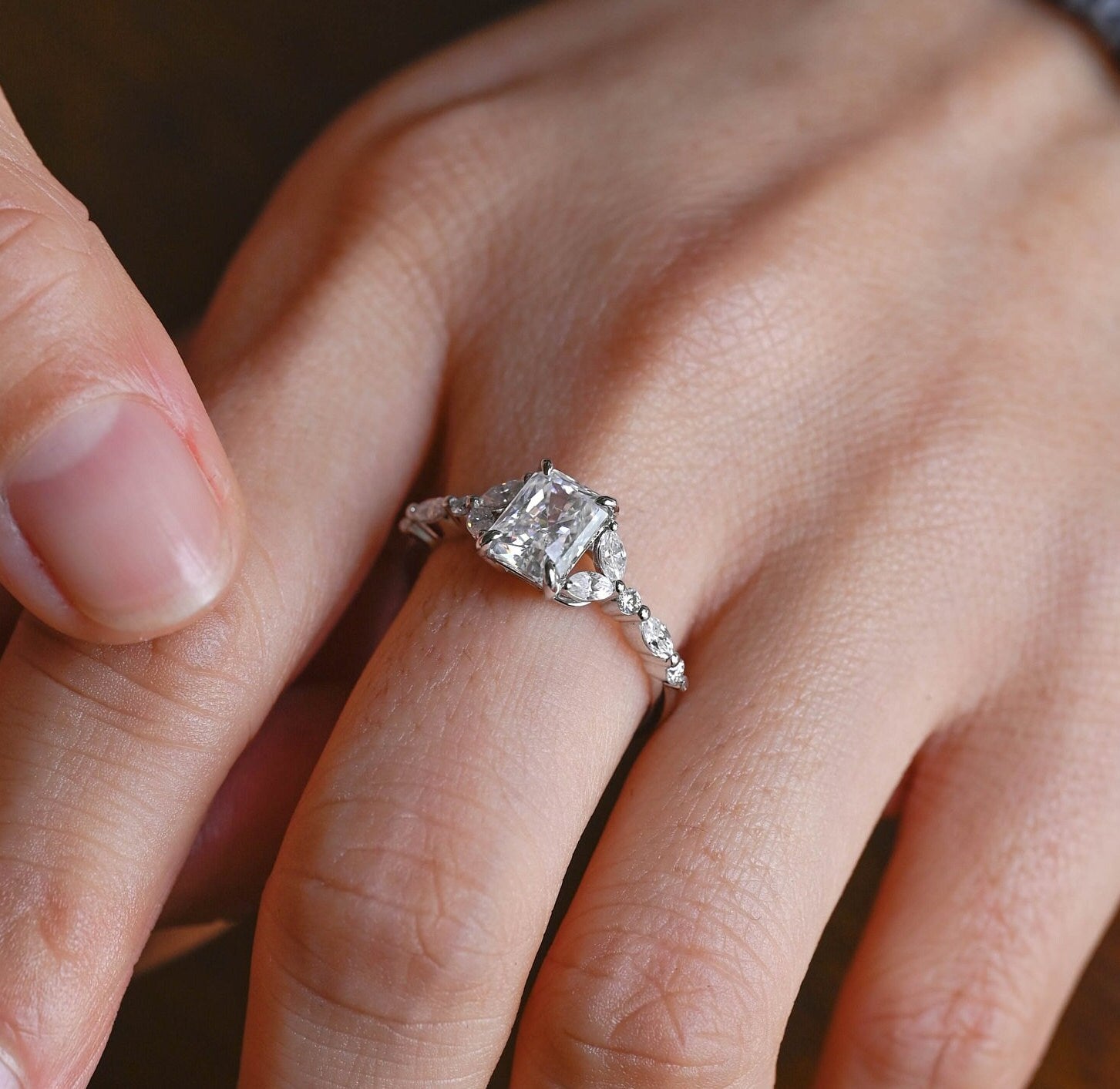 sparkling cluster moissanite engagement ring radiant cut