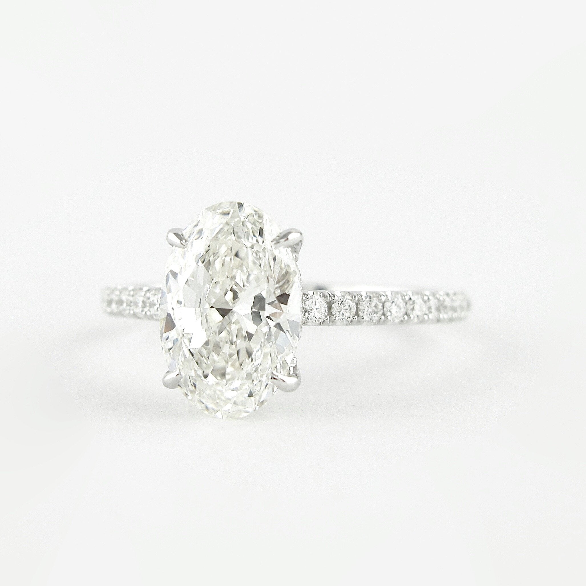 Moissanite openwork trilogy ring New York