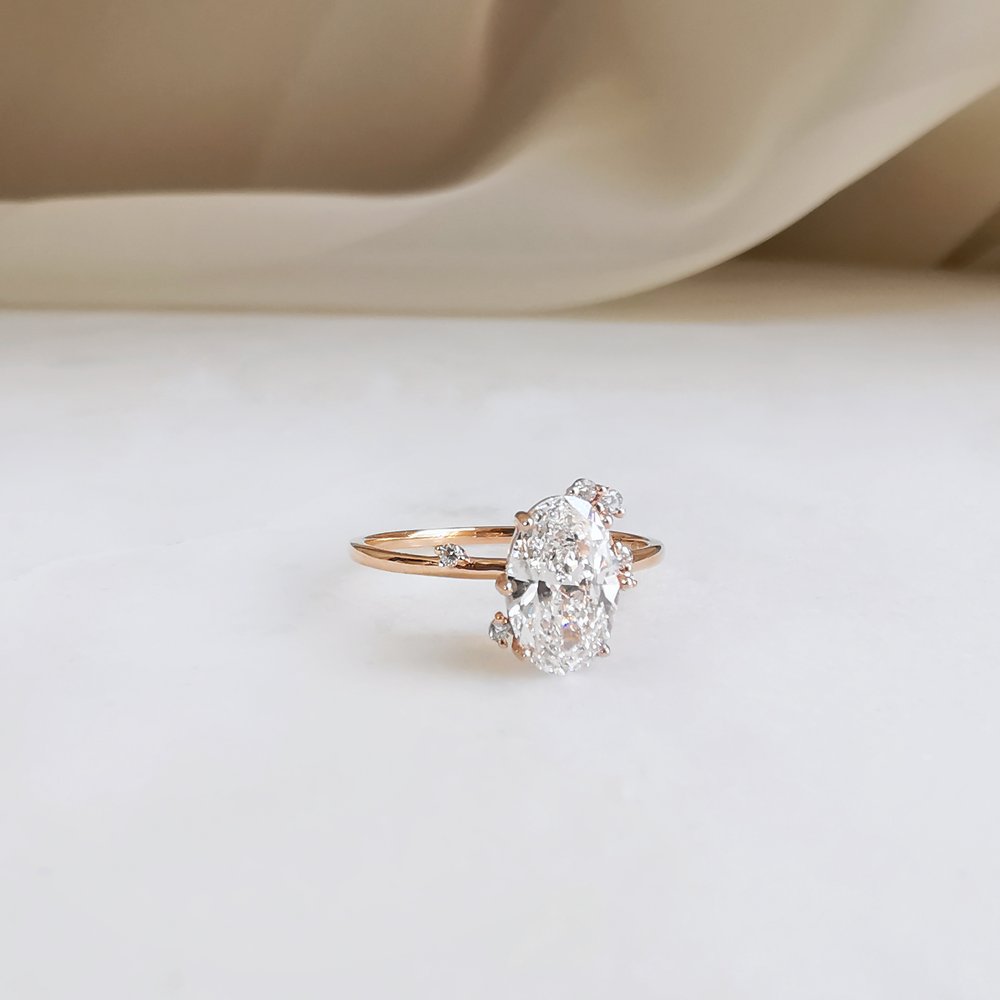 0-50-ct-oval-shaped-moissanite-cluster-engagement-ring