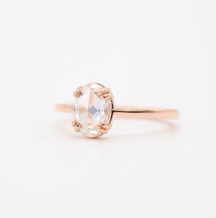 Moissanite engagement rings with hidden halo