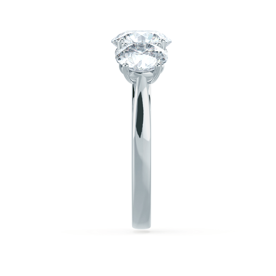 round-shaped-moissanite-three-stone-engagement-ring