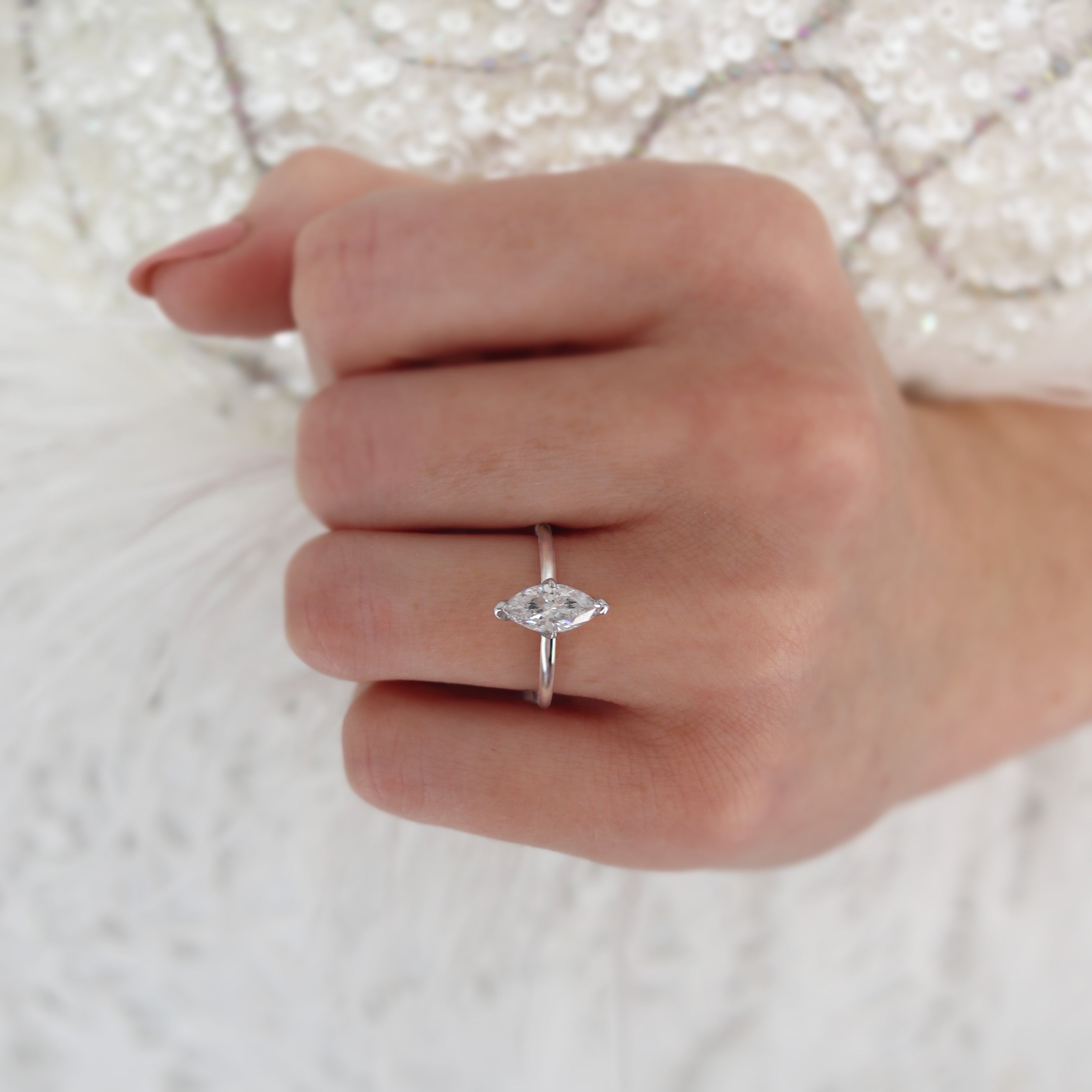 1-0-ct-marquise-shaped-moissanite-solitaire-engagement-ring-7