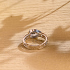 horizontal pear bezel engagement ring moissanite